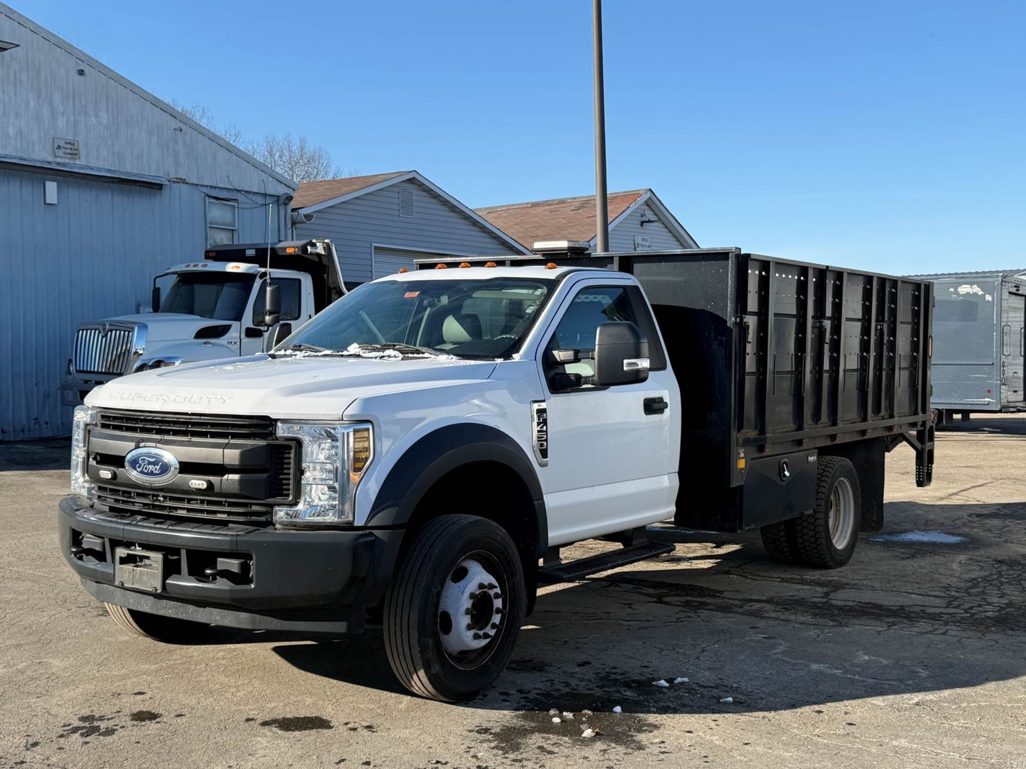 Picture of 2019 Ford F-450 Stake Bed Truck - Stake Body, 12FT- Solid Panels, Delivery, Hauling, Flatbed, Landscape, Gasoline, Inspected Ford V-Shaped