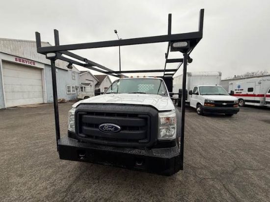 Picture of 2016 Ford F-450 Crew Cab Mechanic / Service Truck, Flatbed Handyman, Diesel, 4x4, Construction, Roofing, Roofer, Plumber, 9Ft Bed, 20FT Ladder Rack Ford V-Shaped