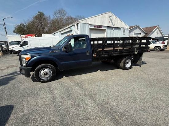 Picture of 2015 Ford F-350 Stake Bed Truck, Under CDL, Automatic, Delivery, Moving, 12FT Bed Gas, Hauler, Mulch, Landscape, Construction, Low Miles, Government Ford V-Shaped