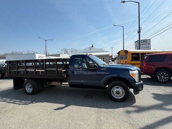 Picture of 2015 Ford F-350 Stake Bed Truck, Under CDL, Automatic, Delivery, Moving, 12FT Bed Gas, Hauler, Mulch, Landscape, Construction, Low Miles, Government Ford V-Shaped