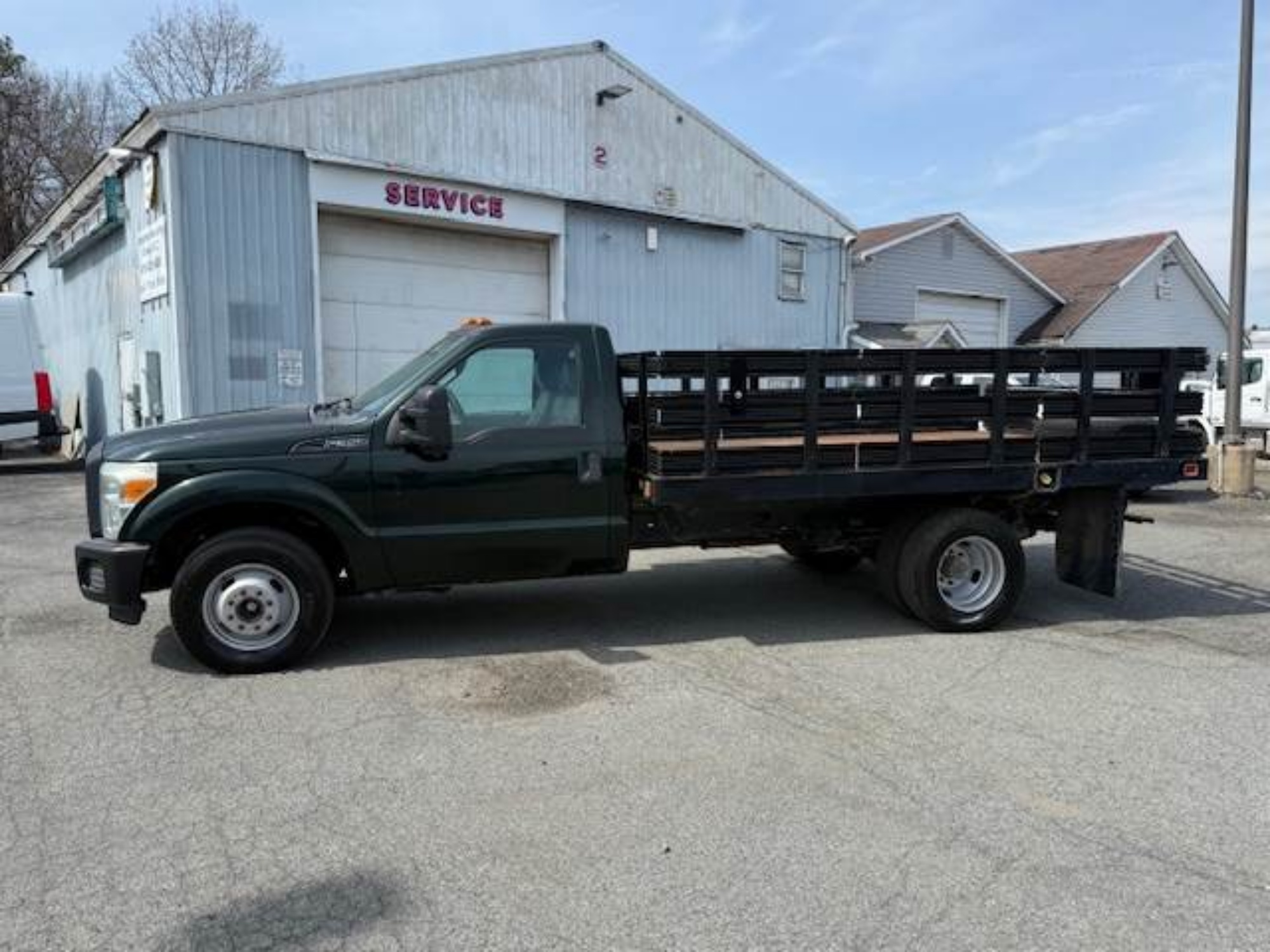 Picture of 2015 Ford F-350 Stake Bed Truck, Under CDL, Automatic, Delivery, Moving, 12FT Bed Gas, Hauler, Mulch, Landscape, Construction, Low Miles, Government Ford V-Shaped