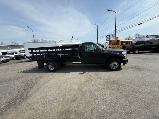 Picture of 2015 Ford F-350 Stake Bed Truck, Under CDL, Automatic, Delivery, Moving, 12FT Bed Gas, Hauler, Mulch, Landscape, Construction, Low Miles, Government Ford V-Shaped
