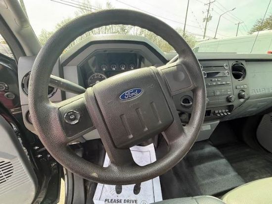Picture of 2015 Ford F-350 Stake Bed Truck, Under CDL, Automatic, Delivery, Moving, 12FT Bed Gas, Hauler, Mulch, Landscape, Construction, Low Miles, Government Ford V-Shaped