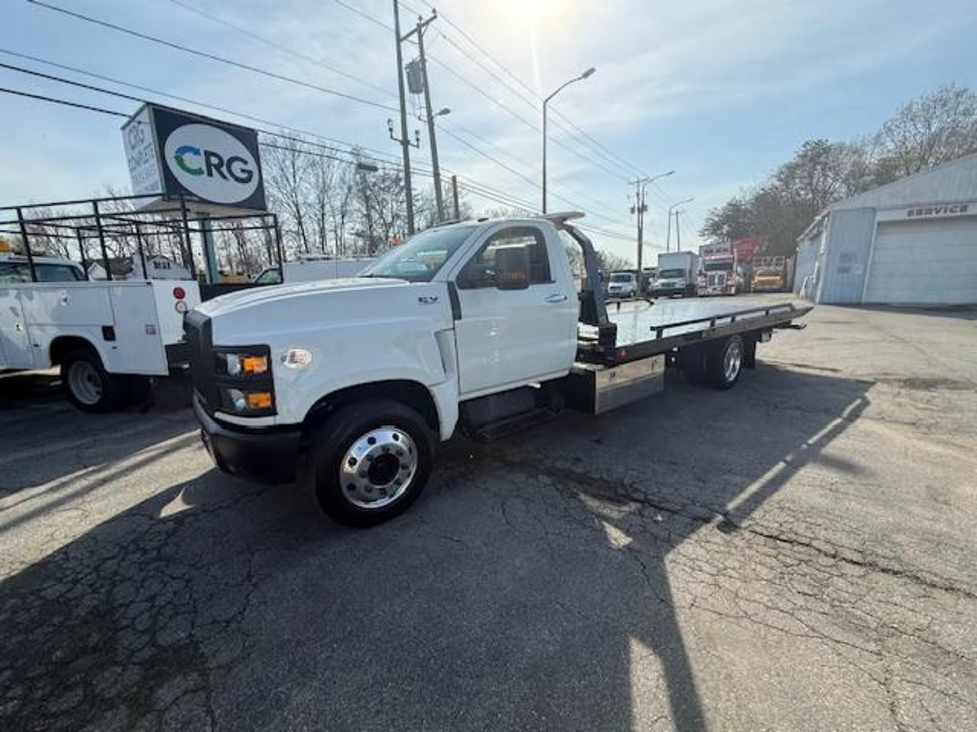 Picture of 2024 International CV515 Rollback Tow Truck, Dump, Flatbed, Jerr-Dan, Delivery, Hauler, Under CDL, Diesel, 200 Miles, Air Ride, PTO, Towing International