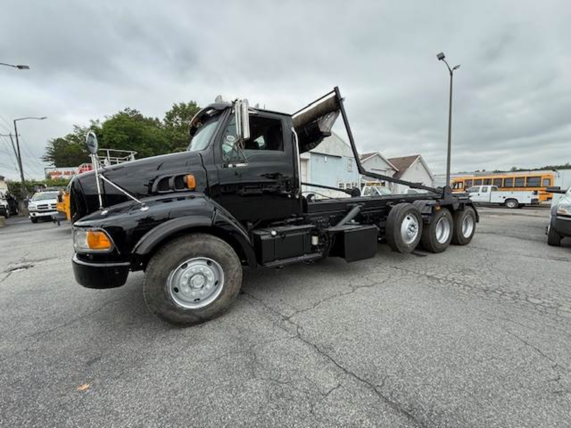 Picture of 2003 Sterling L9500 Roll Off Truck, Hauler, Dumpster, Trash, Recycling, Drop off, Heavy Hauler, Tarp System, Eaton Fuller Mercedes-Benz MBE4000