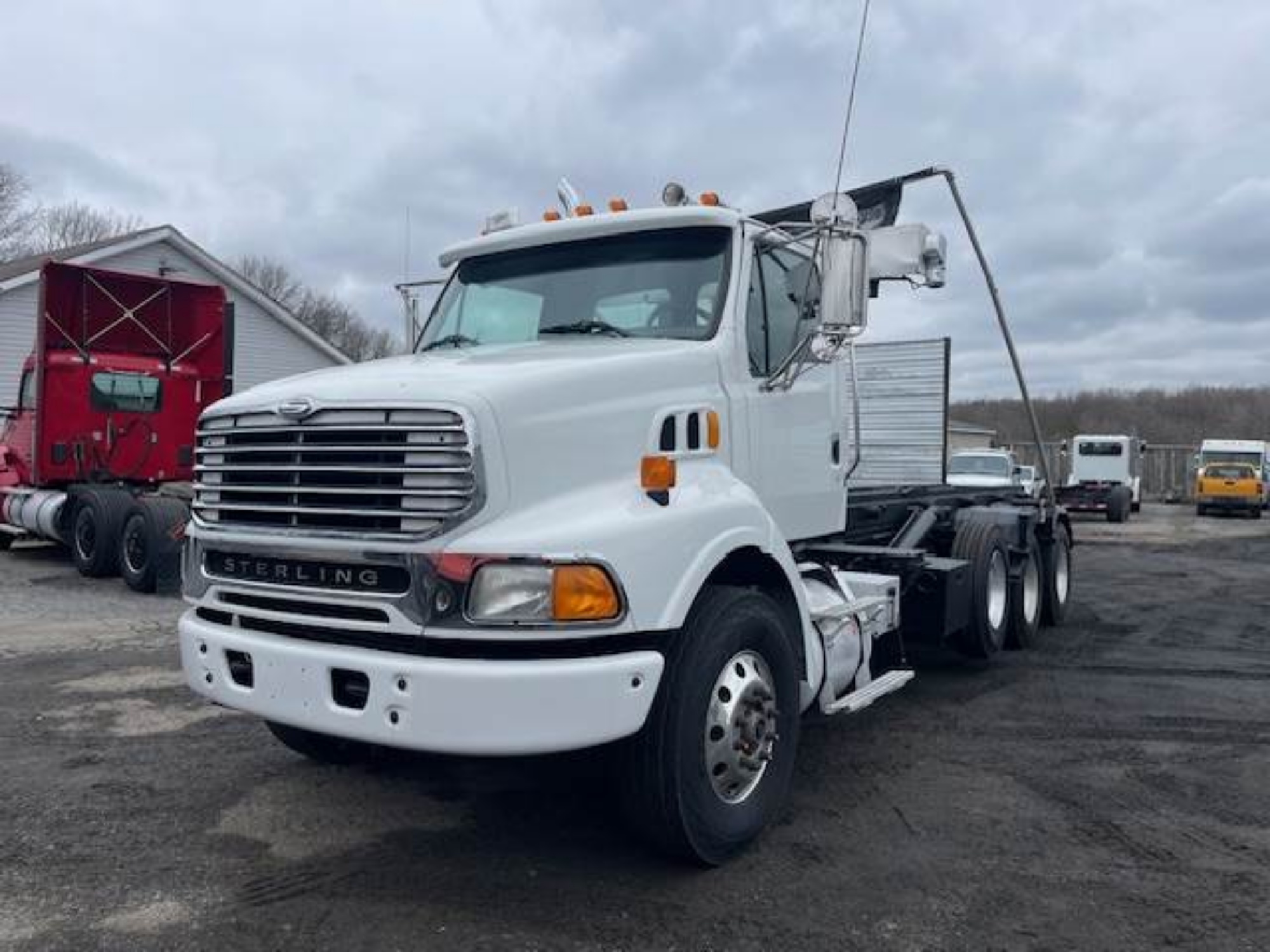 Picture of 2004 Sterling L9500 Roll Off Truck, Dumpster, Trash, Landfill, Delivery, Flatbed, Tarp, Hauler, Tri-Axle, Heavy Spec, Waste, Refuse