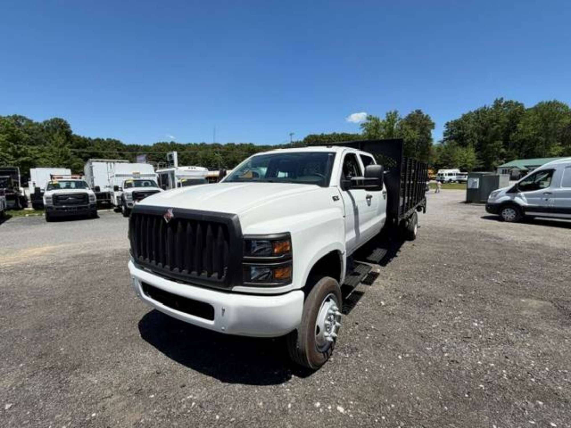 Picture of 2022 International CV515 Crew Cab Stake Bed Truck, 4x4, Maxon Liftgate, 14FT Bed, Low Miles, Delivery, Hauler, Landscape, Flatbed, Diesel
